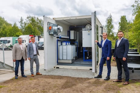 Closed-loop water reuse system at an industrial textile-service laundry